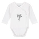 Tekst baby overslag romper (wit) met daarop de tekst 'All the luck you need, you can find in here!'